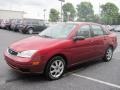 2005 Sangria Red Metallic Ford Focus ZX4 SE Sedan  photo #3