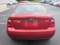 2005 Sangria Red Metallic Ford Focus ZX4 SE Sedan  photo #9