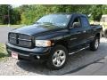 2005 Black Dodge Ram 1500 SLT Quad Cab 4x4  photo #1