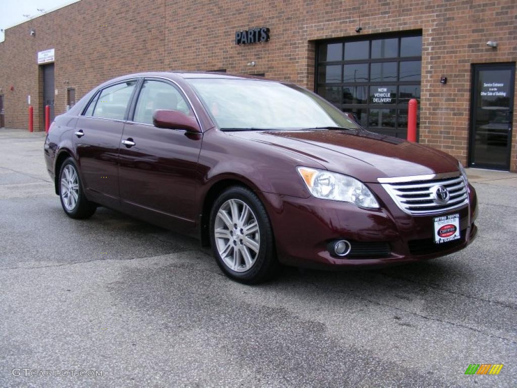 2010 Avalon Limited - Cassis Red Pearl / Ivory photo #1