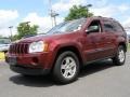 2007 Red Rock Crystal Pearl Jeep Grand Cherokee Laredo 4x4  photo #1