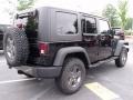 2010 Black Jeep Wrangler Unlimited Mountain Edition 4x4  photo #3