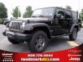 2010 Black Jeep Wrangler Unlimited Mountain Edition 4x4  photo #1