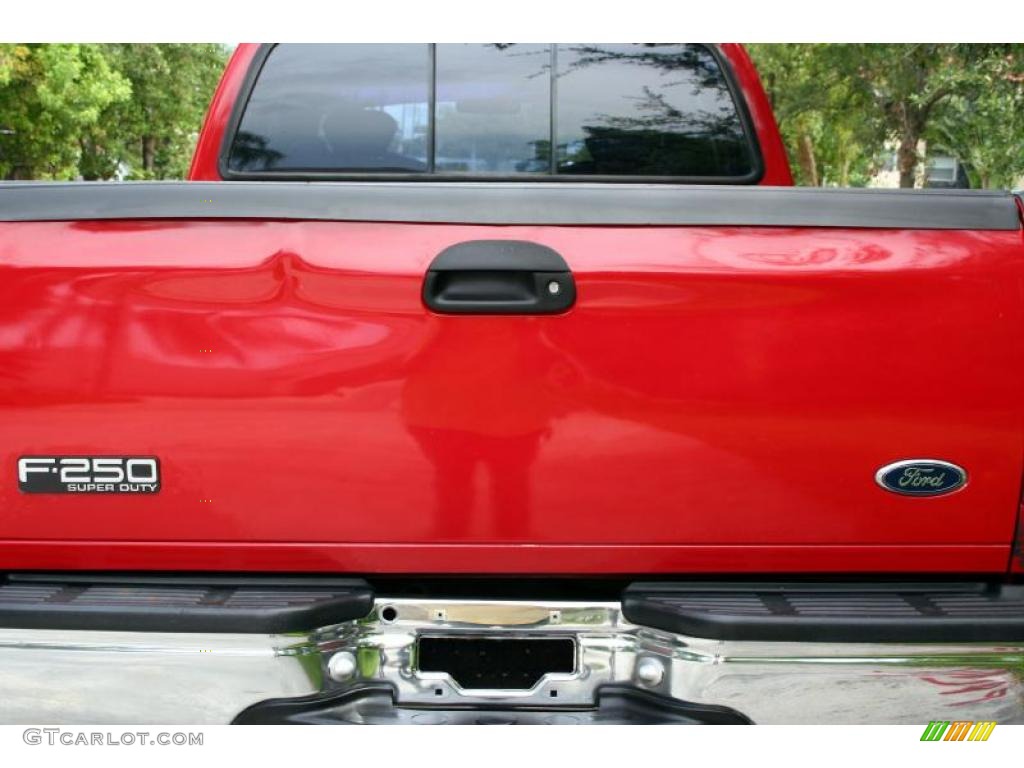 1999 F250 Super Duty Lariat Extended Cab 4x4 - Red / Medium Graphite photo #8