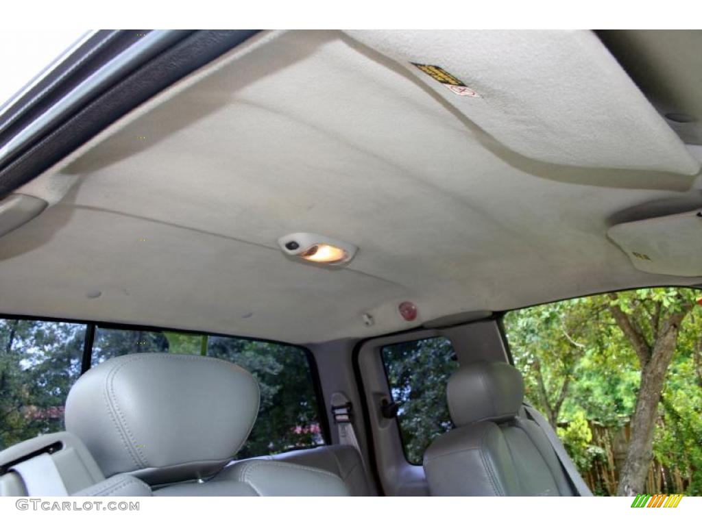 1999 F250 Super Duty Lariat Extended Cab 4x4 - Red / Medium Graphite photo #37