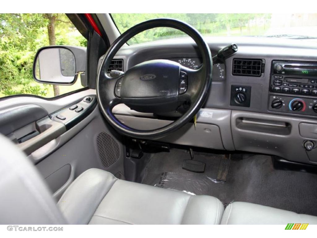 1999 F250 Super Duty Lariat Extended Cab 4x4 - Red / Medium Graphite photo #65