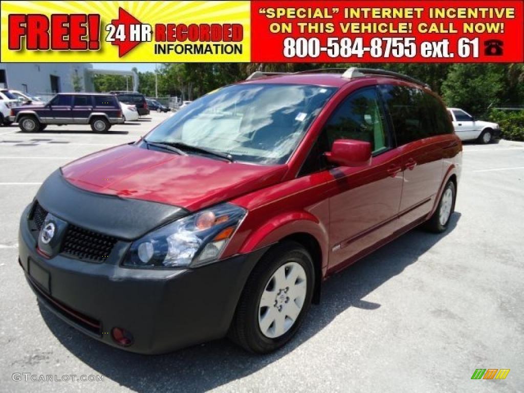 Red Brawn Metallic Nissan Quest