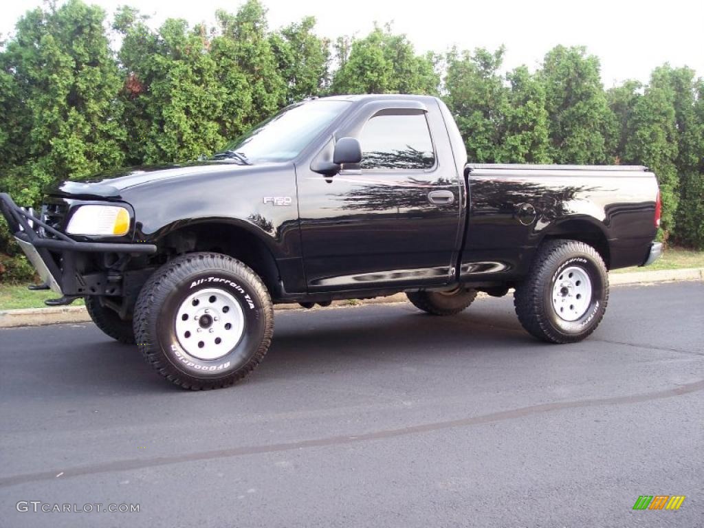 2004 F150 XL Heritage Regular Cab 4x4 - Black / Tan photo #1