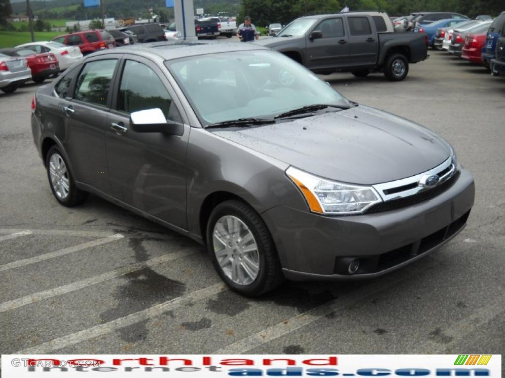 2011 Focus SEL Sedan - Sterling Gray Metallic / Medium Stone photo #4