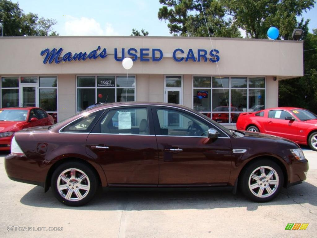 Sangria Red Metallic Ford Taurus