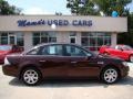 2009 Sangria Red Metallic Ford Taurus Limited  photo #1