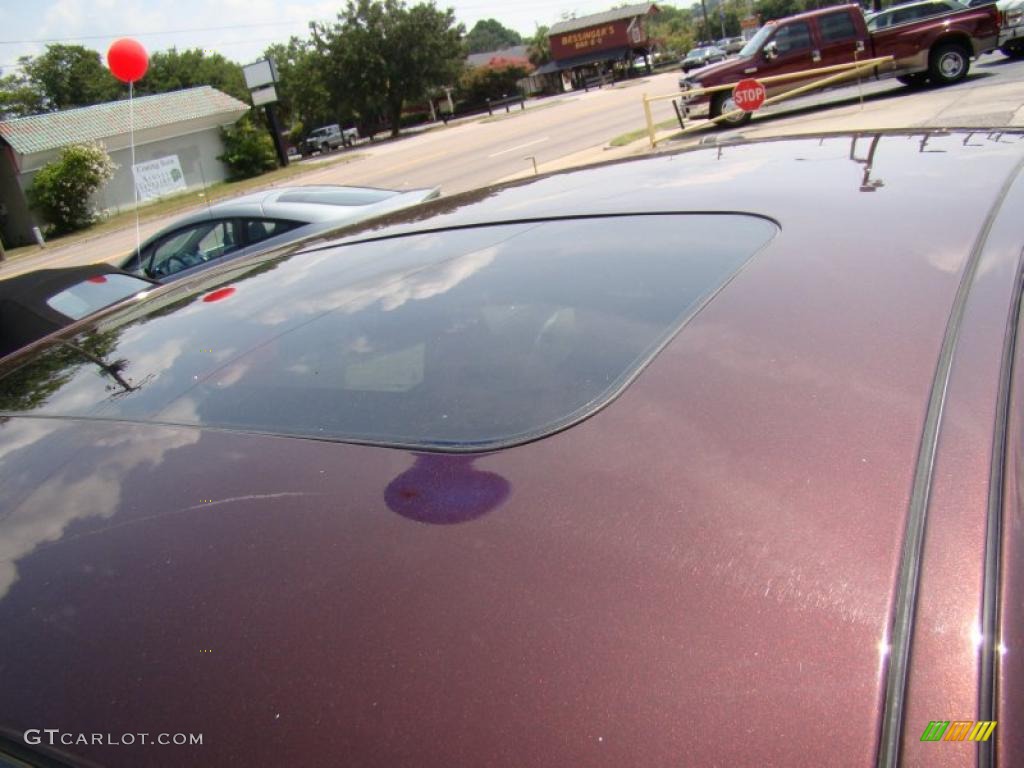 2009 Taurus Limited - Sangria Red Metallic / Camel photo #37
