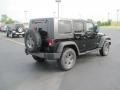 2010 Black Jeep Wrangler Unlimited Mountain Edition 4x4  photo #4