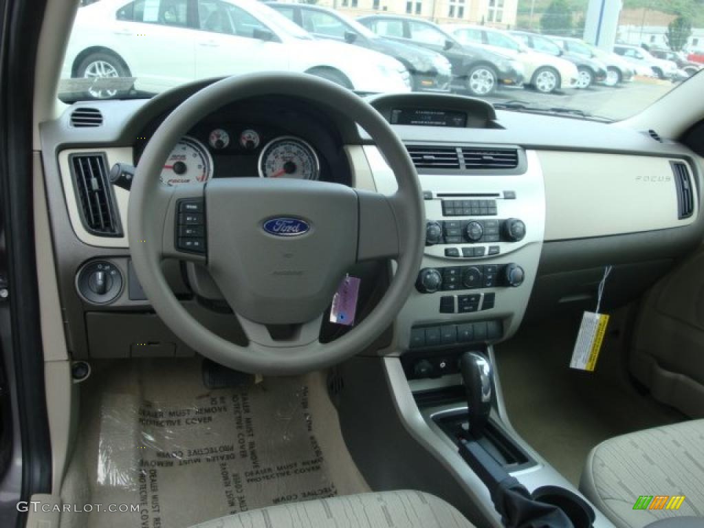2011 Focus SE Sedan - Sterling Gray Metallic / Medium Stone photo #13