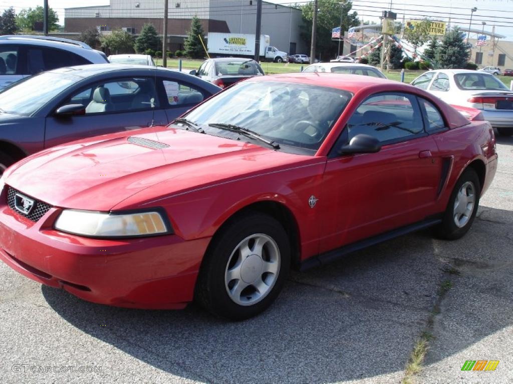 1999 Mustang V6 Coupe - Rio Red / Dark Charcoal photo #1