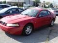 1999 Rio Red Ford Mustang V6 Coupe  photo #1