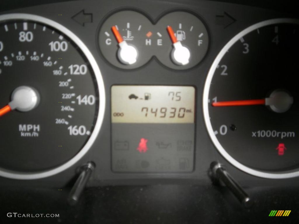 2006 Tiburon SE - Electric Red / Black/Red photo #7