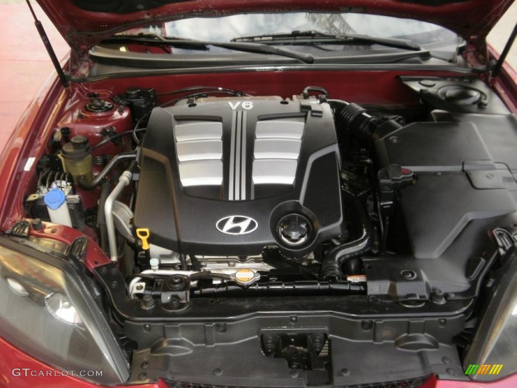 2006 Tiburon SE - Electric Red / Black/Red photo #11