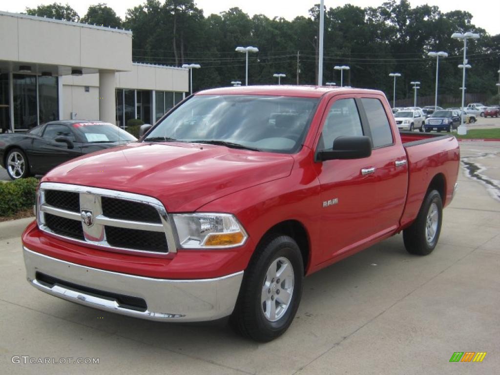 2010 Ram 1500 SLT Quad Cab - Flame Red / Dark Slate/Medium Graystone photo #1