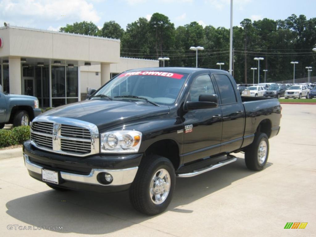 2009 Ram 2500 Lone Star Quad Cab 4x4 - Brilliant Black Crystal Pearl / Khaki photo #1