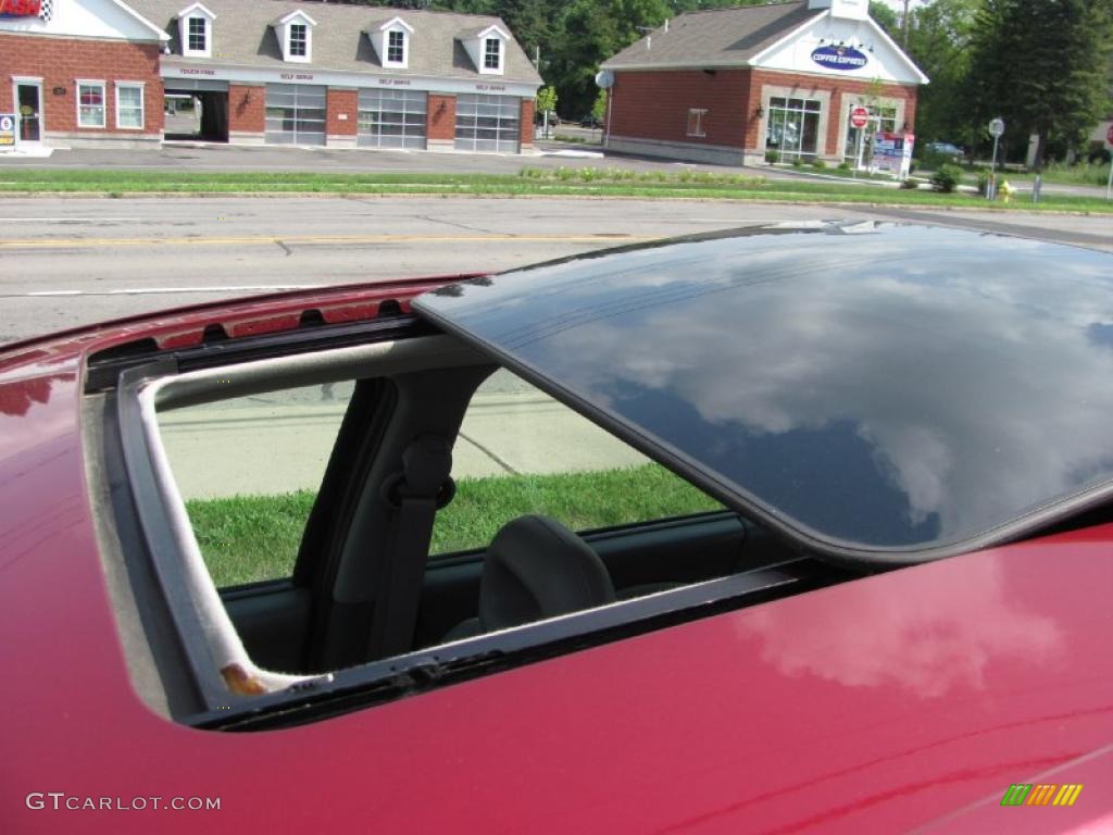 2007 ION 3 Sedan - Berry Red / Gray photo #9