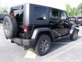 2010 Black Jeep Wrangler Unlimited Mountain Edition 4x4  photo #3