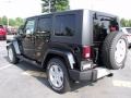 2010 Black Jeep Wrangler Unlimited Sahara  photo #2