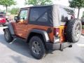 2010 Mango Tango Pearl Jeep Wrangler Sport Mountain Edition 4x4  photo #2