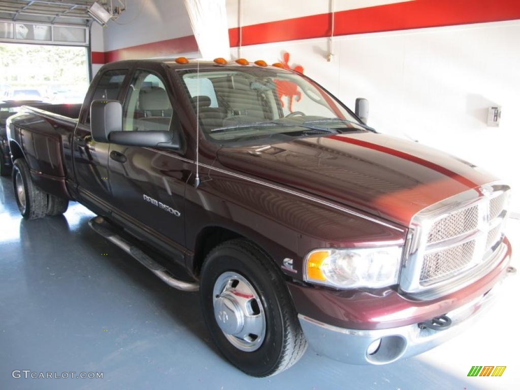 2004 Ram 3500 SLT Quad Cab Dually - Deep Molten Red Metallic / Taupe photo #1