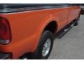 2004 Black/Competition Orange Ford F250 Super Duty Harley Davidson Crew Cab 4x4  photo #7