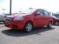 2010 Victory Red Chevrolet Aveo LT Sedan  photo #1