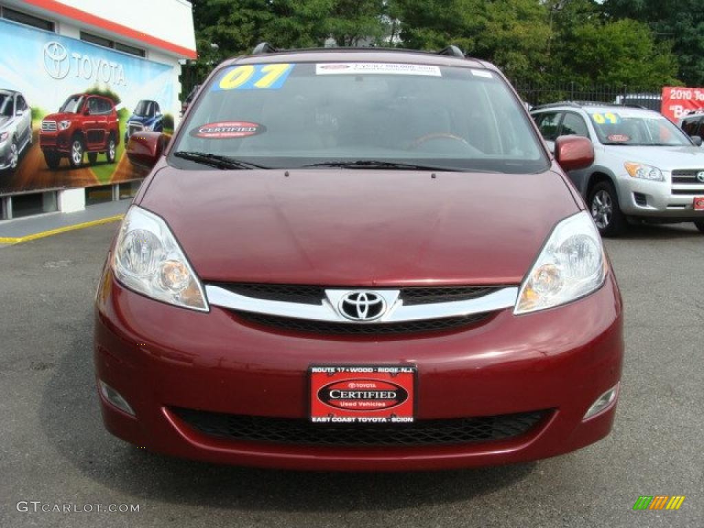 2007 Sienna XLE Limited AWD - Salsa Red Pearl / Stone photo #2