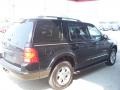 2004 Black Ford Explorer Limited 4x4  photo #24