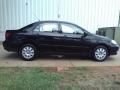 2003 Black Sand Pearl Toyota Corolla LE  photo #17