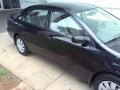 2003 Black Sand Pearl Toyota Corolla LE  photo #21