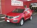 2011 Signal Red Kia Sportage LX  photo #1