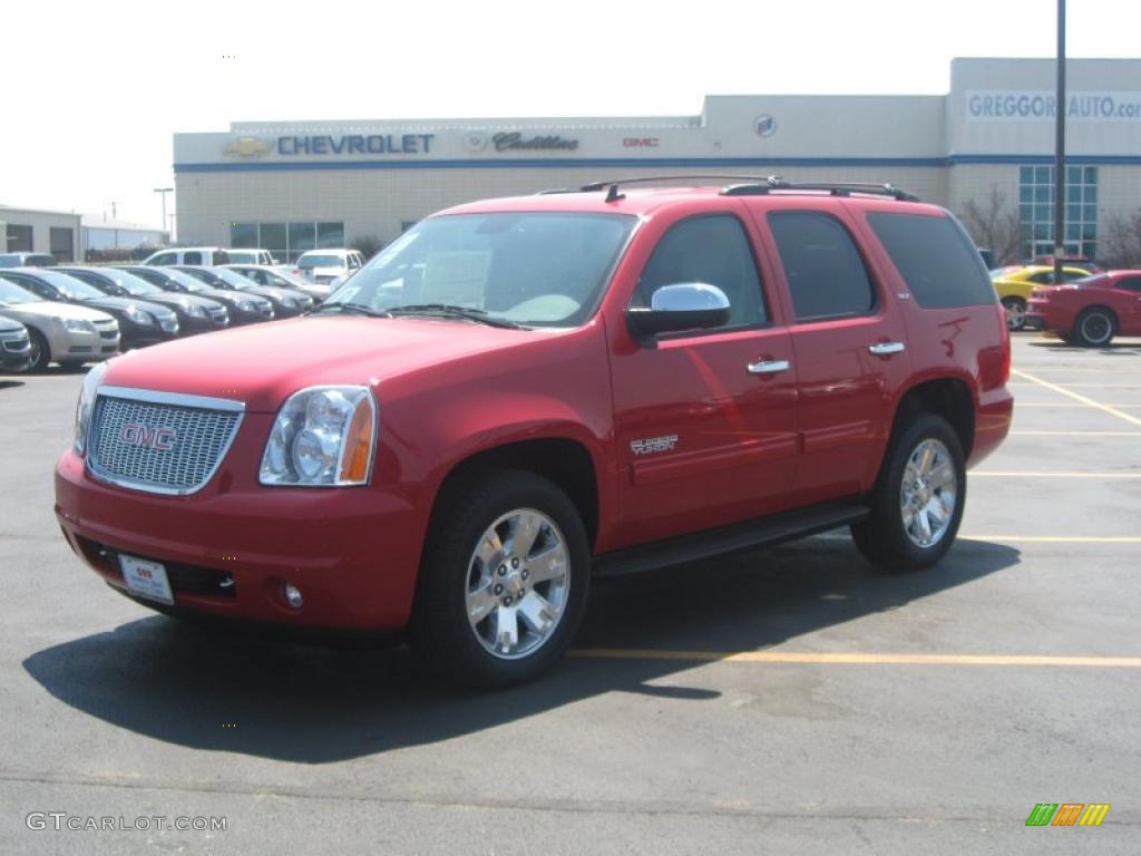 2010 Yukon SLT 4x4 - Red Jewel Tintcoat / Light Tan photo #1