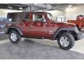 2010 Red Rock Crystal Pearl Jeep Wrangler Unlimited Sport 4x4  photo #3