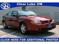 Redfire Metallic 2000 Pontiac Grand Am SE Sedan