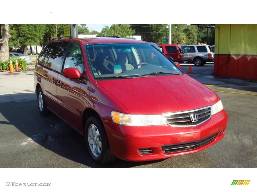 Red Rock Pearl Honda Odyssey