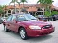 2003 Matador Red Metallic Ford Taurus SE  photo #1