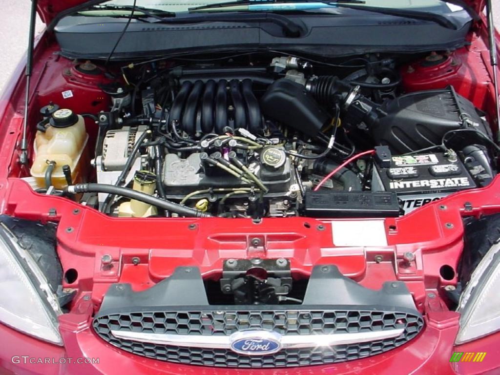 2003 Taurus SE - Matador Red Metallic / Medium Parchment photo #25