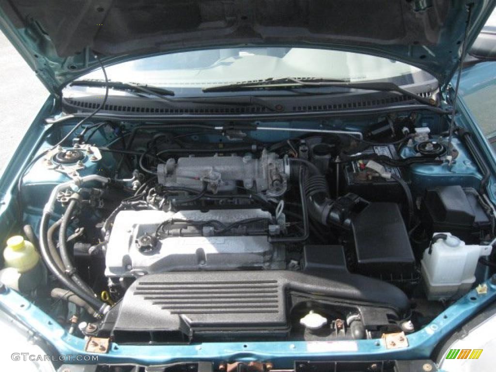 2001 Protege DX - Seabreeze Green Mica / Beige photo #24