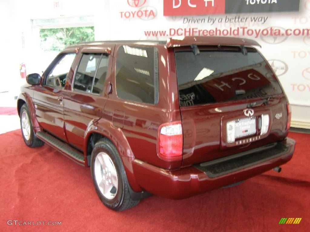2002 QX4 4x4 - Royal Ruby Metallic / Stone Beige photo #6