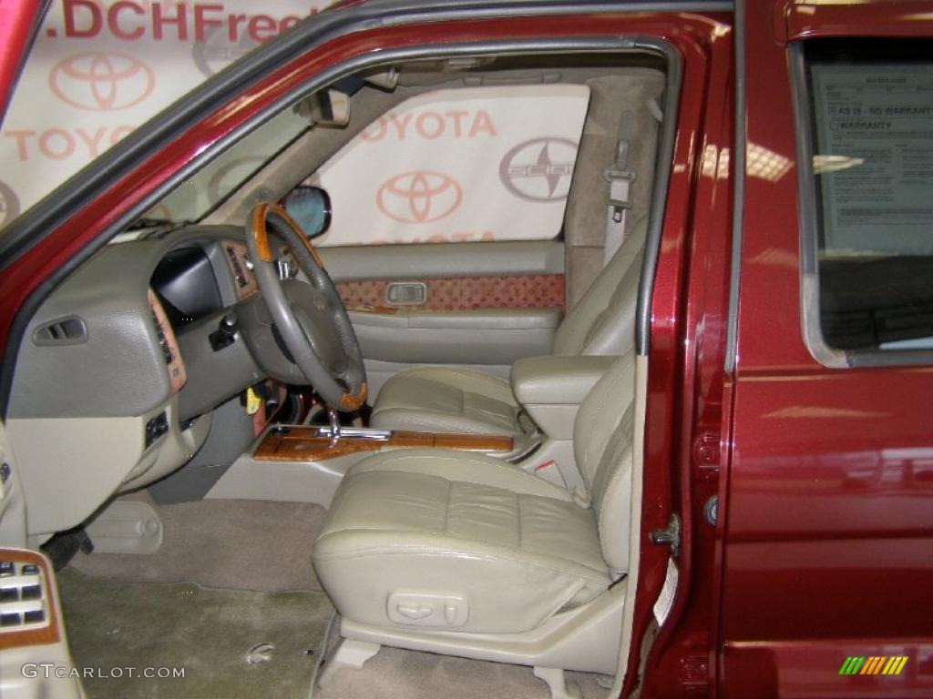 2002 QX4 4x4 - Royal Ruby Metallic / Stone Beige photo #12