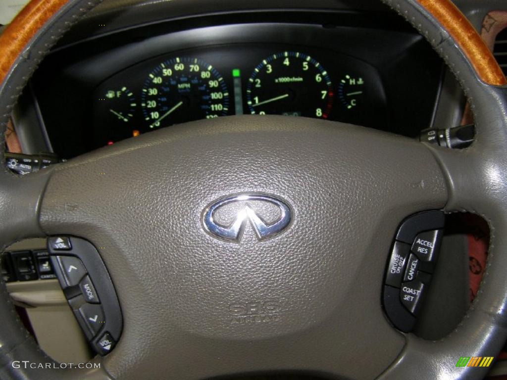 2002 QX4 4x4 - Royal Ruby Metallic / Stone Beige photo #18