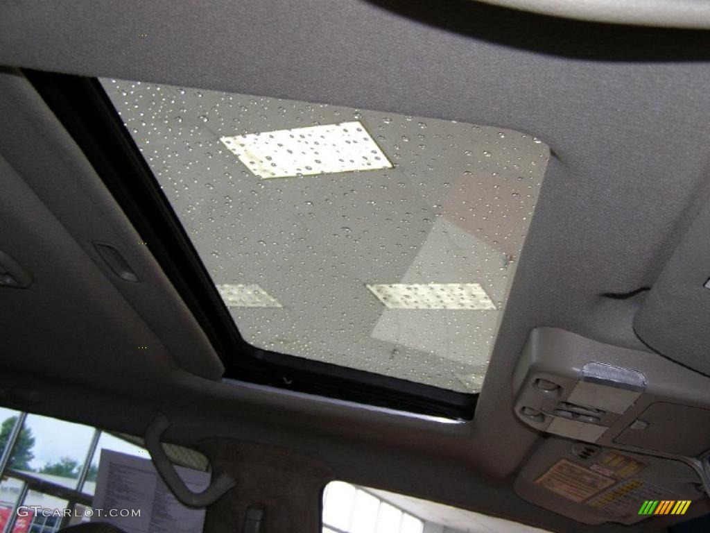 2002 QX4 4x4 - Royal Ruby Metallic / Stone Beige photo #26
