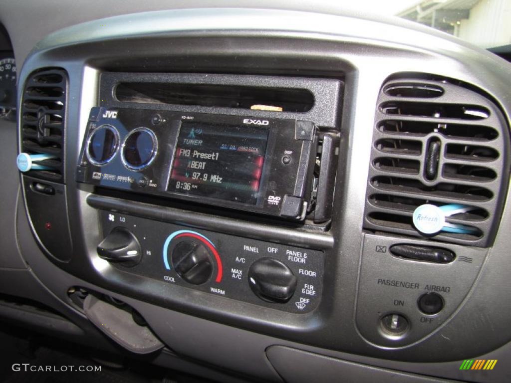 2004 F150 STX Regular Cab - Bright Red / Medium Graphite photo #13