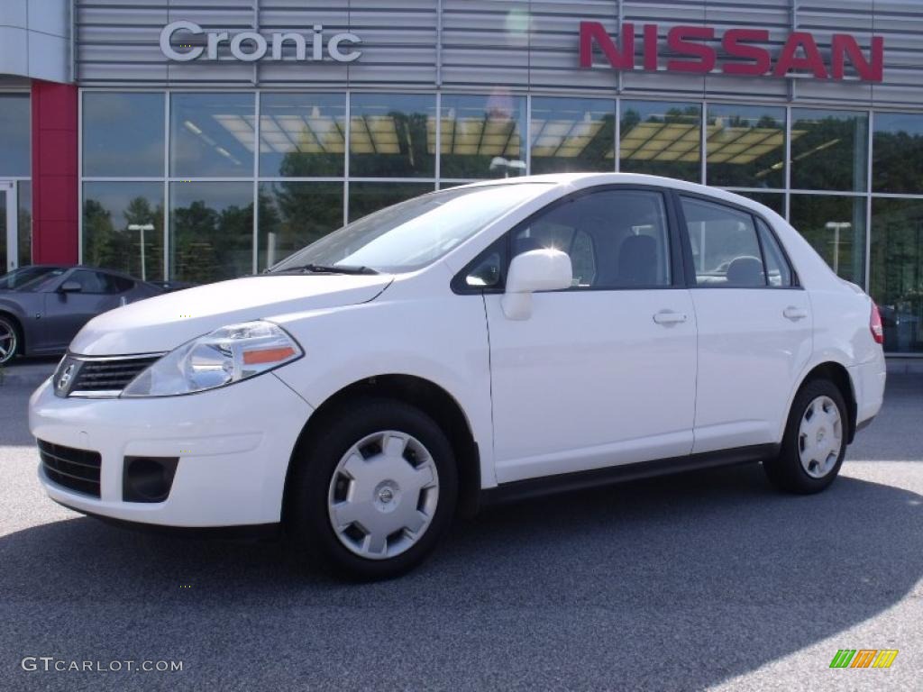 2009 Versa 1.8 S Sedan - Fresh Powder / Charcoal photo #1