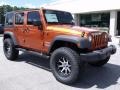 2010 Mango Tango Pearl Jeep Wrangler Unlimited Sport 4x4  photo #2
